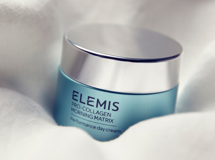 Close up on Elemis Pro-collagen morning matrix cream in a blue tub with silver lid