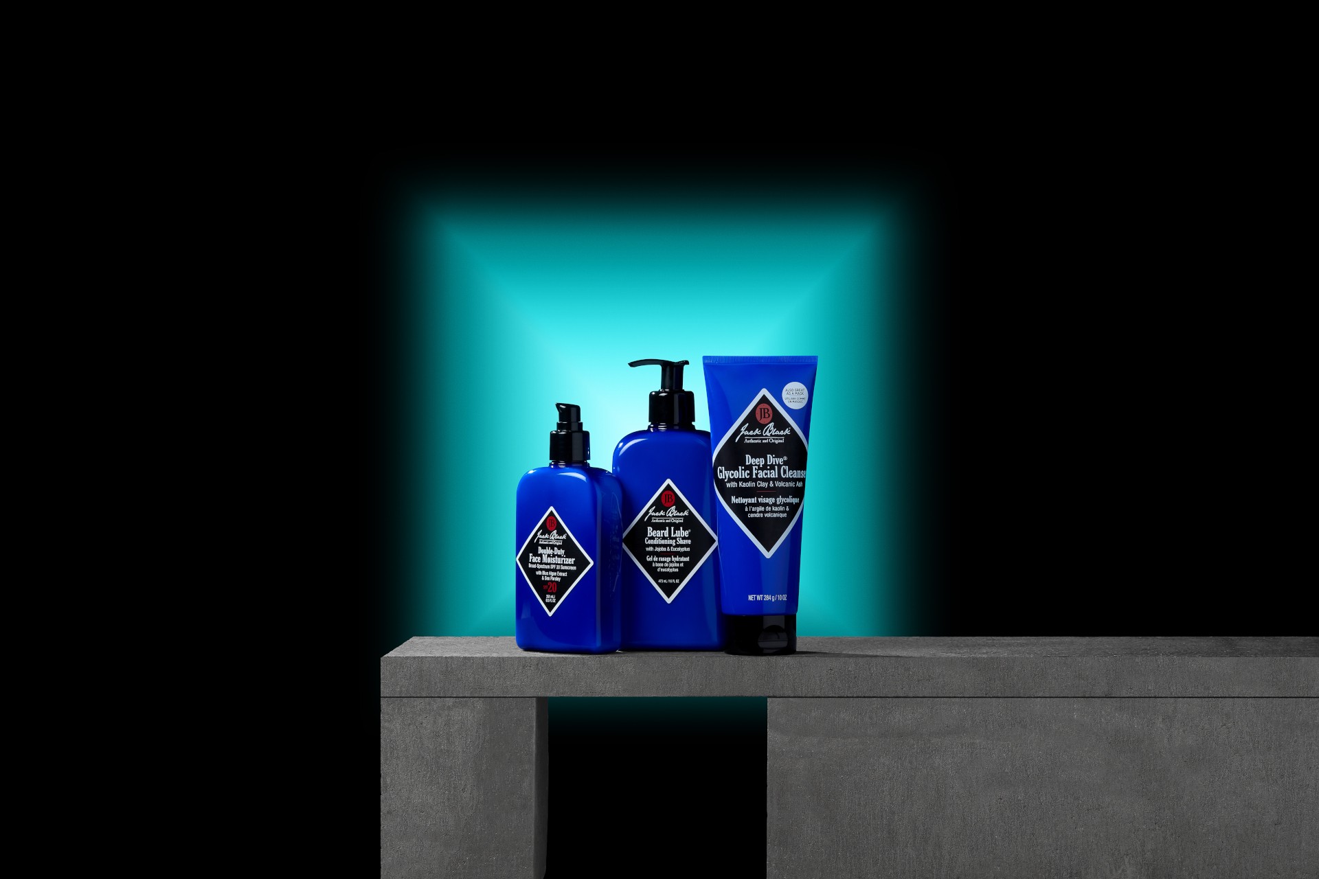 Jack Black male grooming products on black and light blue background