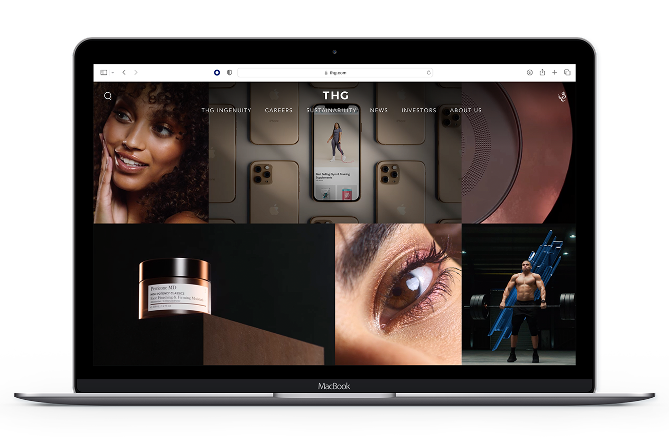 Macbook displaying the THG homepage, including a a collage of six photos that contain a weightlifter, a beauty model, moisturiser, and an iphone.