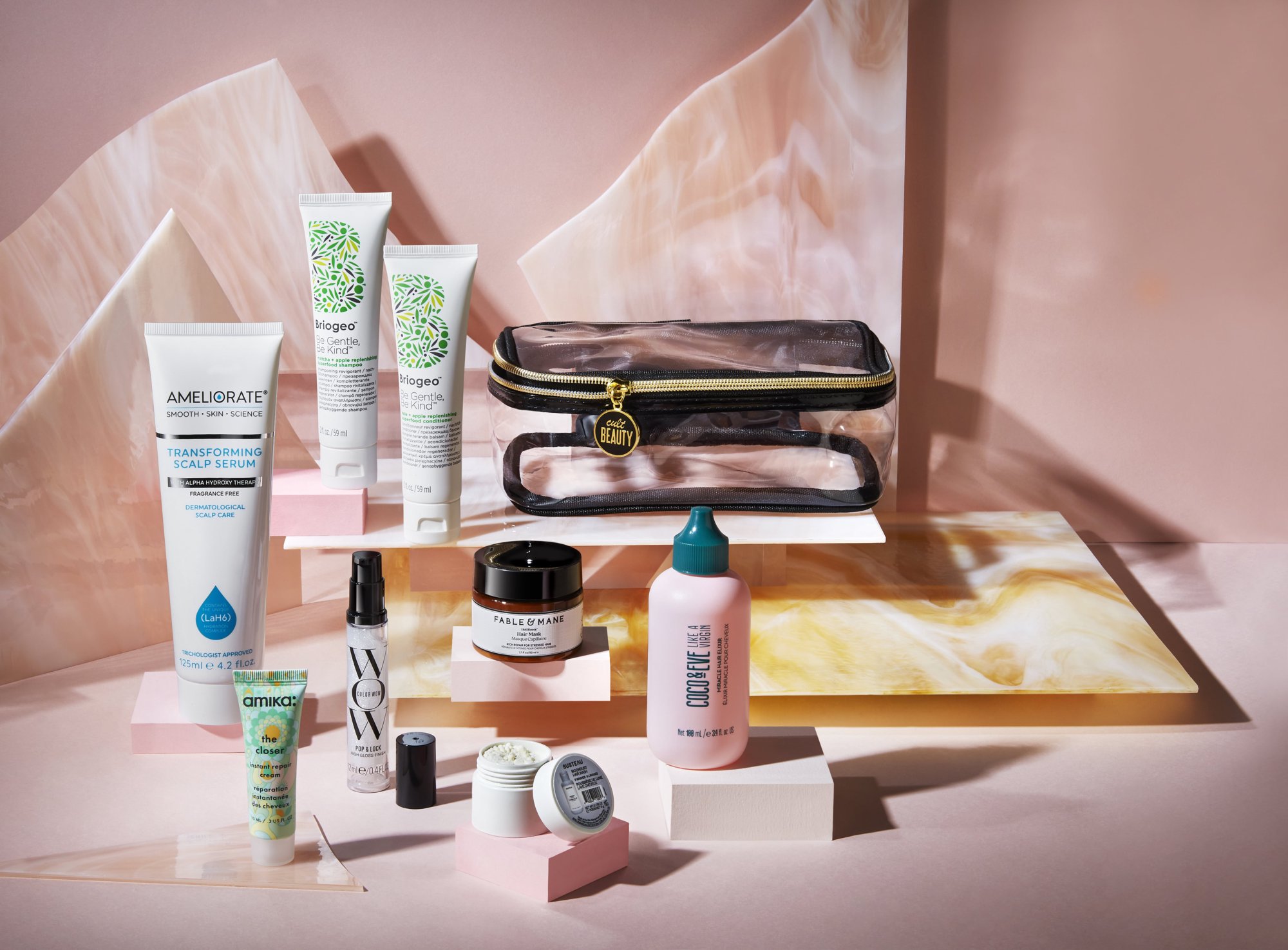 Beauty products on multicoloured textured background