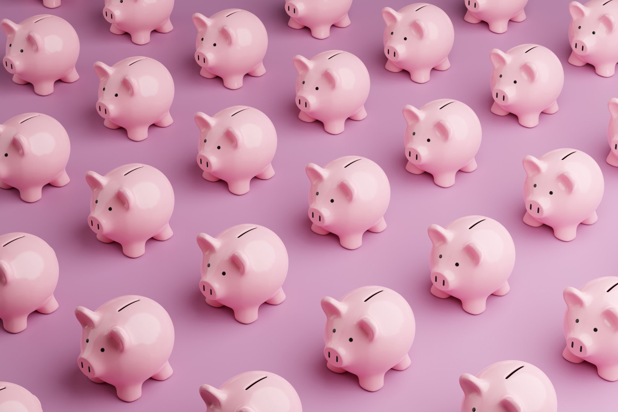 Lines of pink piggy banks on a pink background